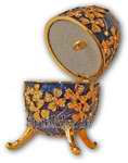 Schmuck-Ei-Blau mit Spieluhr nach Faberge-Art aus emailiertem Metall
